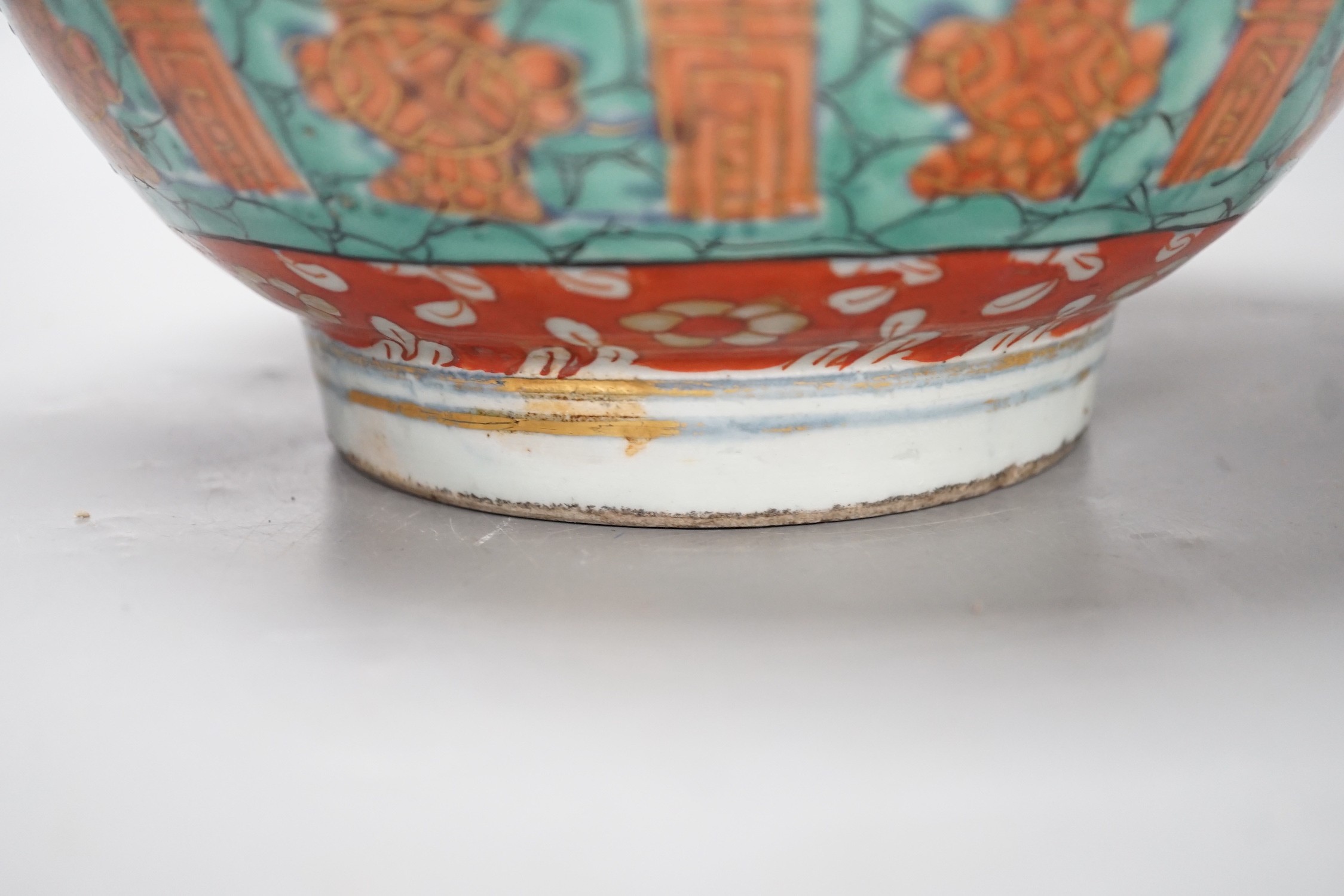 An 18th century clobbered Chinese or Japanese porcelain bowl, 24.5cm diameter